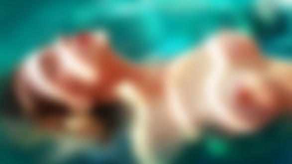 Обои на рабочий стол Девушка с оголенной грудью лежит в воде, by gromwulf
