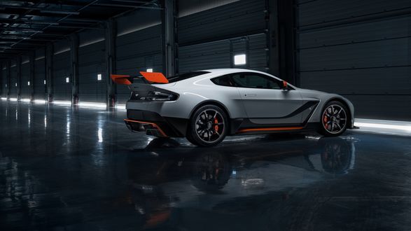 Обои на рабочий стол Автомобиль Aston martin vantage v12 в боксе