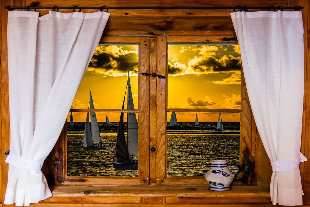 Обои для рабочего стола Окно с занавесками, ваза на подоконнике, за стеклом парусные яхты в море на закате, by Gerhard Gellinger
