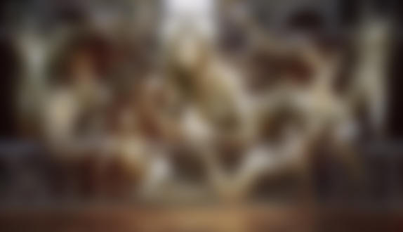 Обои на рабочий стол Мужчина и женщина стоят у Wall of the Ancients / Стены Древних с обнаженными скульптурами людей, by Christophe Young