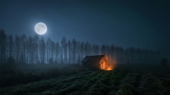 Обои на рабочий стол Костер возле заброшенной сторожки лунной ночью