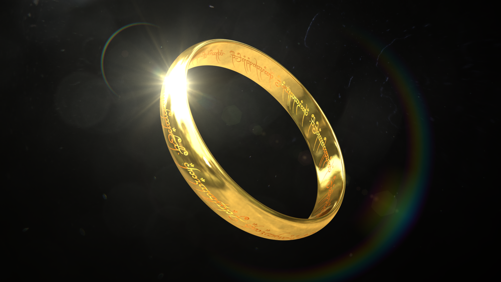 Кольцо оказалось золотым. Золотое кольцо на черном фоне. Золотой фон с кольцами. Золотое кольцо на темном фоне. Свадебные кольца на черном фоне.
