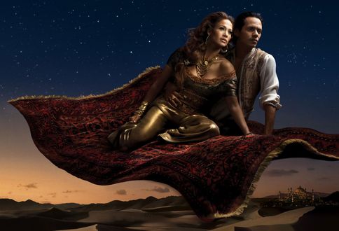 Обои на рабочий стол Дженнифер Лопес / Jennifer Lopez и Марк Энтони / Marc Anthony летят на ковре самолете