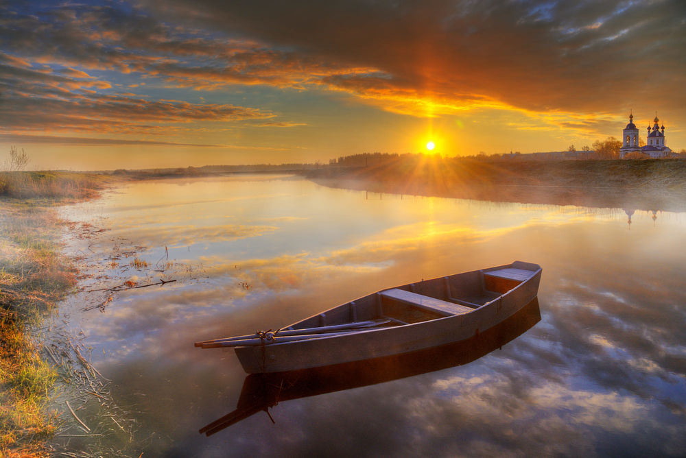 Обои для рабочего стола Лодка на воде. Фотограф Ed Gordeev