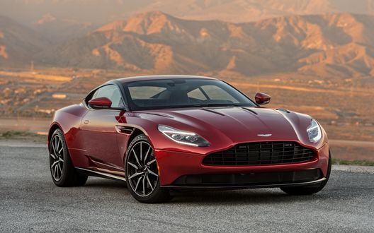 Обои на рабочий стол Вишневый Aston Martin DB11 Volante на фоне гор