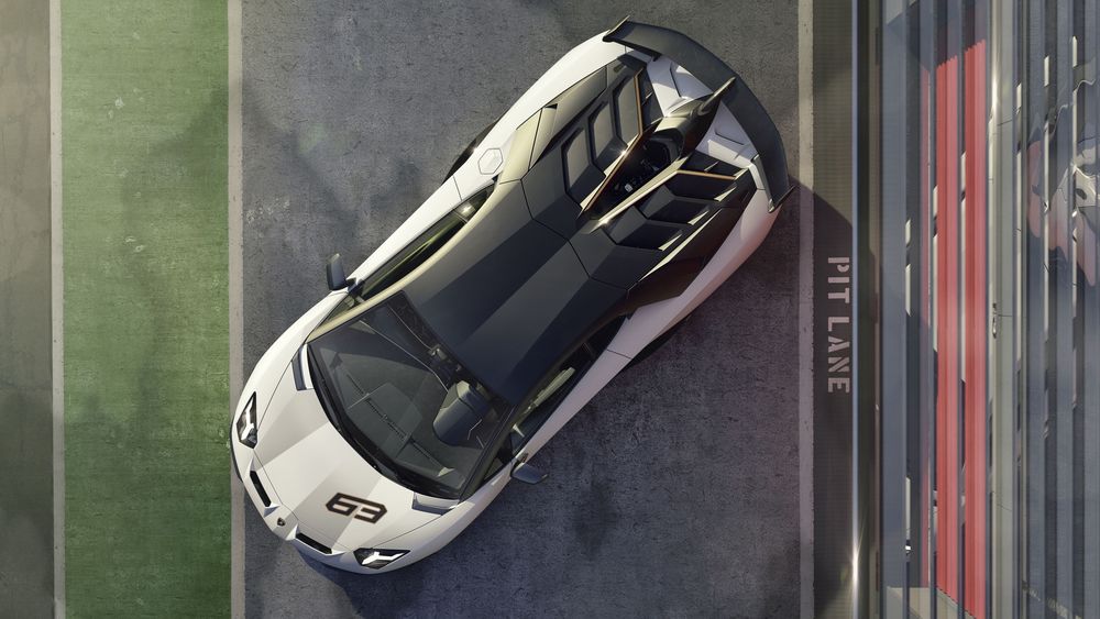 Обои для рабочего стола Lamborghini Aventador SV J стоит на пит-лейне