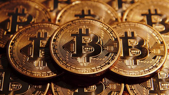 Обои на рабочий стол Монеты Bitcoin крупным планом