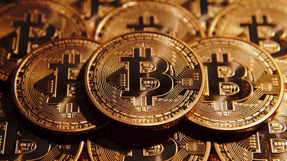 Обои для рабочего стола Монеты Bitcoin крупным планом