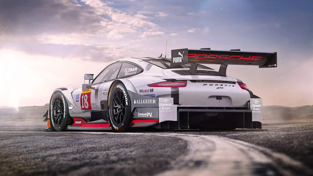 Обои для рабочего стола Авто марки Porsche 911 GT-3 стоит на треке