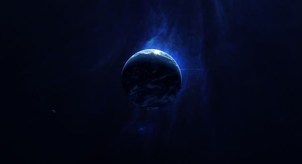 Обои на рабочий стол Планета на фоне сине-голубой космической туманности