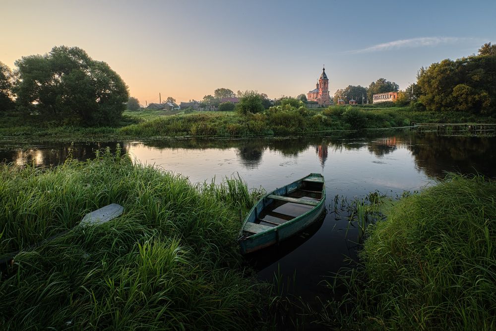 Обои для рабочего стола Лодка на воде. Фотограф Бельцев Григорий