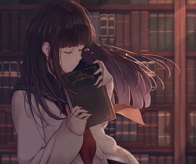 Обои на рабочий стол Девушка плачет, держа в руках книгу