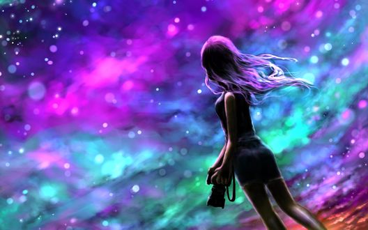Обои на рабочий стол Девушка с фотоаппаратом в руке стоит стоит на фоне разноцветного неба, by vV-ave