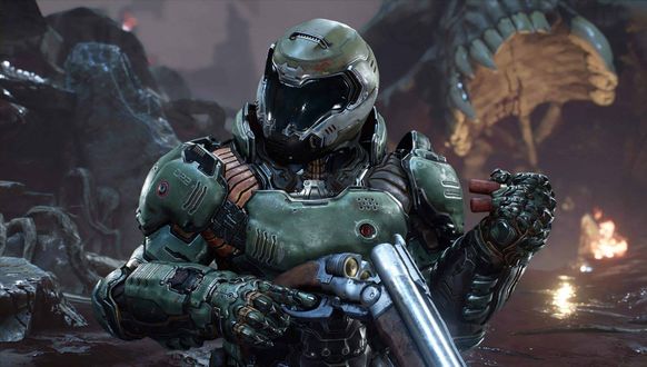 Обои на рабочий стол Солдат в скафандре заряжает дробовик, арт к игре Doom Eternal