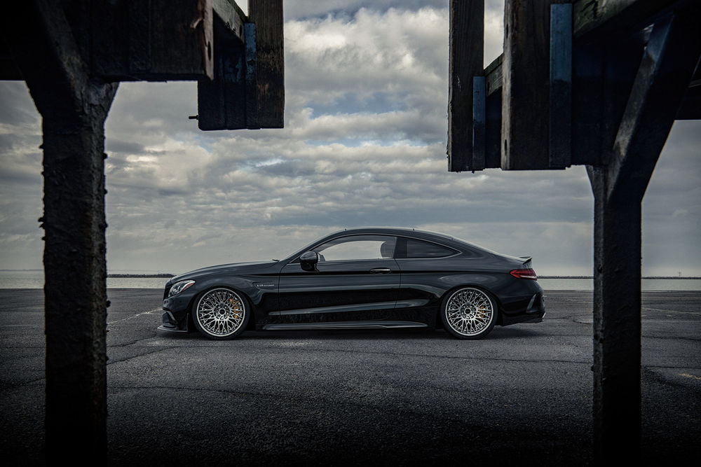 Обои для рабочего стола Черный Mercedes E-Class coupe 2019 на площадке под облачным небом, by Sergey Poltavskiy