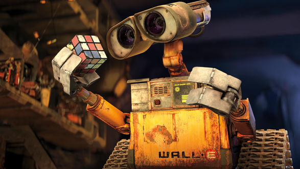 Обои на рабочий стол Робот ВАЛЛ-И / WALL-E из одноименного мультика с интересом смотрит на Кубик Рубика, автор BlinkJisooXPS