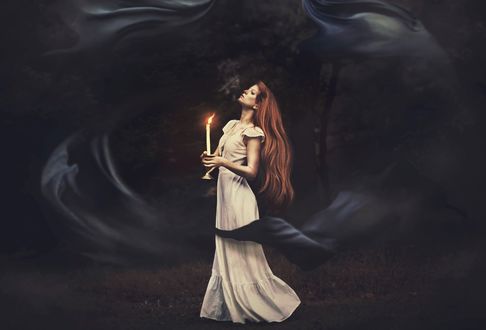 Обои на рабочий стол Девушка в длинном платье стоит со свечой в руках, by Shelby Robinson
