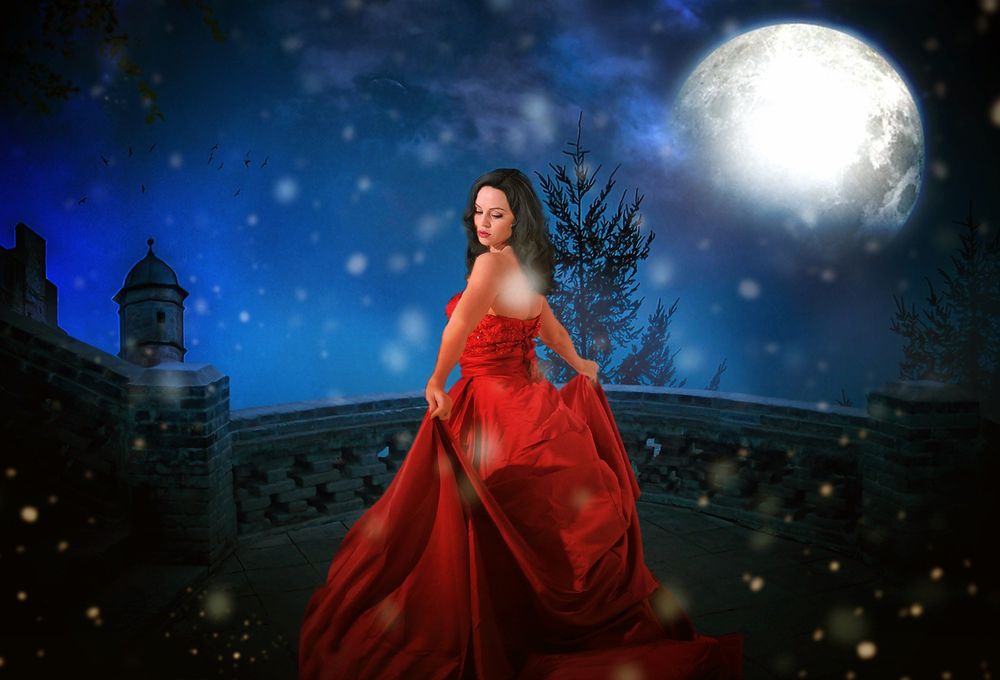 Обои для рабочего стола Девушка в красном платье стоит на фоне ночного неба с луной, by Shrikesh Kumar