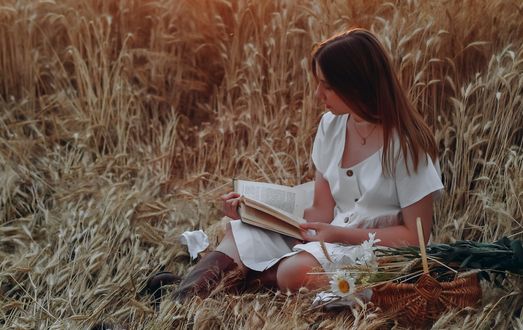 Обои на рабочий стол Девушка с книгой сидит на колосистом поле, by Raspopova Marina