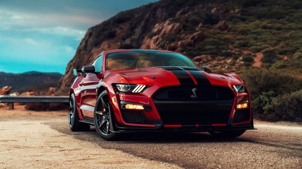 Обои на рабочий стол Автомобиль Ford Mustang на горной дороге