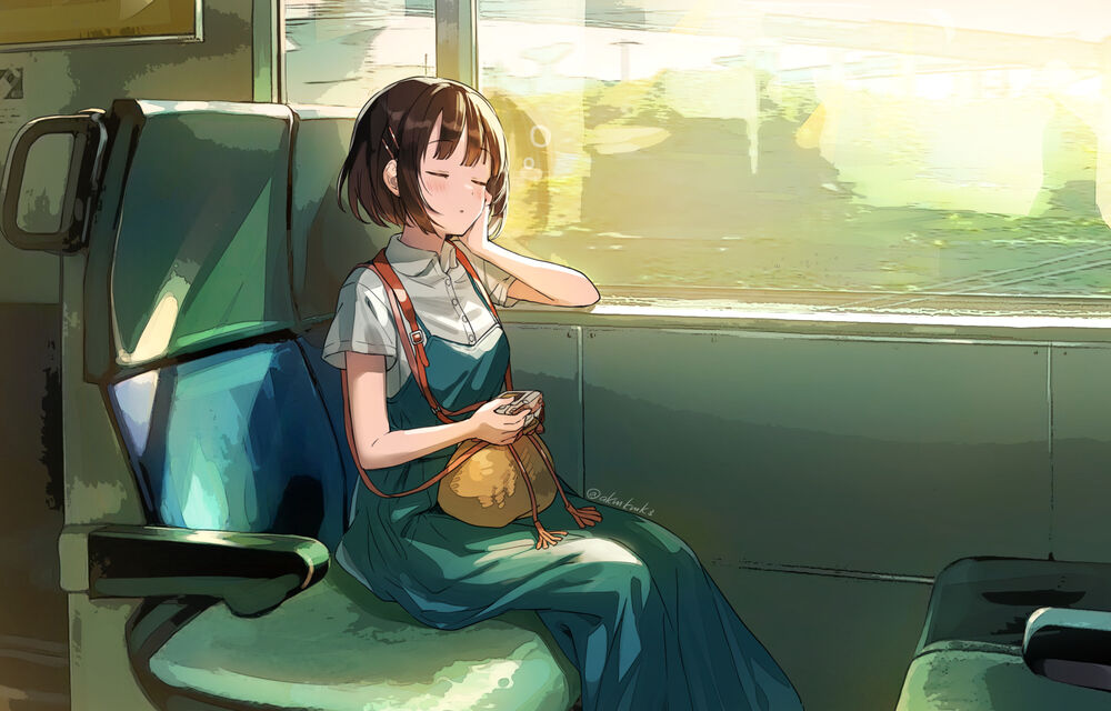 Обои для рабочего стола Девушка уснула в поезде, сидя в лучах солнца возле окна