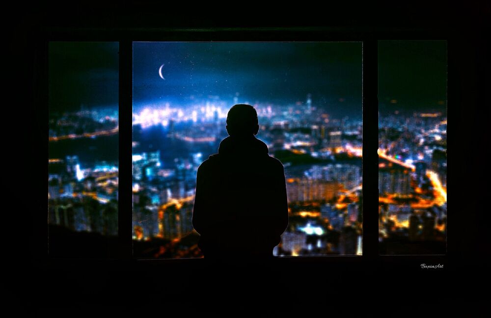Обои для рабочего стола Парень стоит у окна и смотрит на ночной город, by Barbara Florczyk