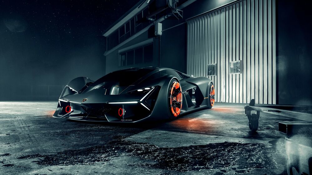 Обои для рабочего стола Черный автомобиль с красными колесами ночью в гараже