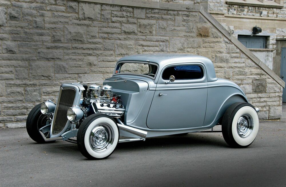 Обои для рабочего стола Classic Ford Coupe Hot Rod 1934 у каменной стены особняка