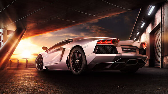 Обои на рабочий стол Спортивный автомобиль Lamborghini Aventador - у ангара на закате