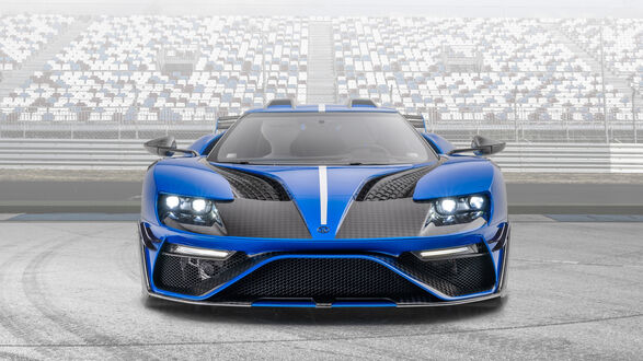Обои на рабочий стол Спорткар синего цвета Ford GT Mansory на треке