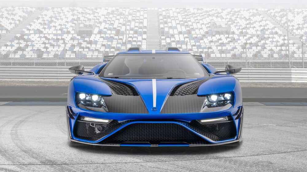 Обои для рабочего стола Спорткар синего цвета Ford GT Mansory на треке