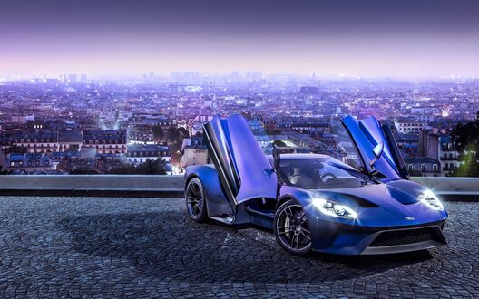 Обои на рабочий стол Суперкар SSC Ultimate Aero на фоне города
