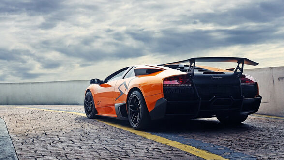 Обои на рабочий стол Lamborghini murcielago оранжевый вид сзади