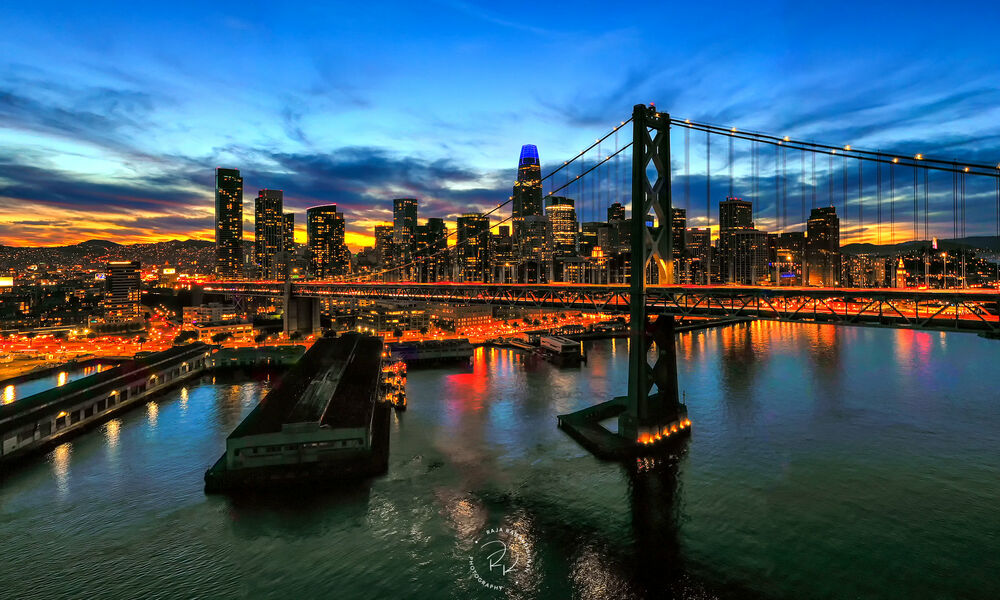 Обои для рабочего стола Мост Bay Bridge / Бэй-Бридж между Сан-Франциско и Оклендом / San Francisco, Oakland на фоне заката
