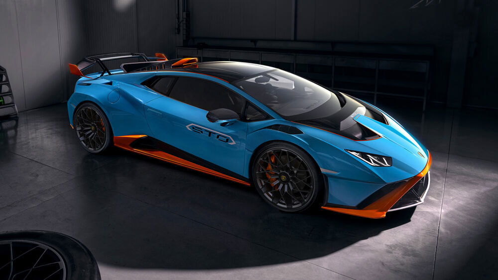 Обои для рабочего стола Синяя спортивная машина Lamborghini Huracan STO в гараже