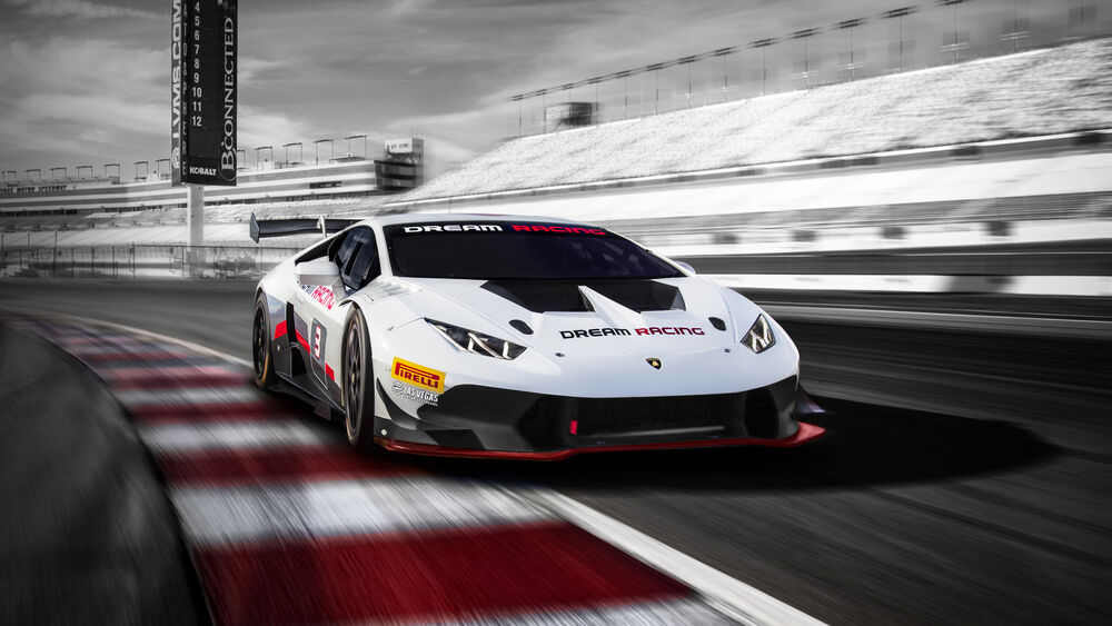 Обои для рабочего стола Lamborghini Huracan белого цвета мчится на треке