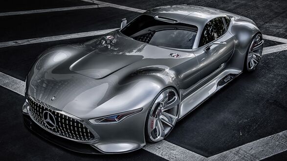 Обои на рабочий стол Серебристый Mercedes Benz AMG Vision Gran Turismo на асфальте