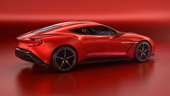 Обои на рабочий стол Красный Aston Martin на красном фоне