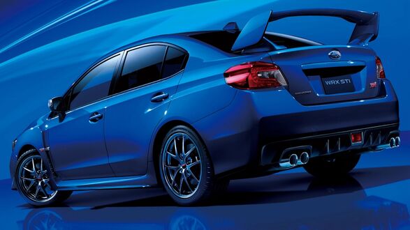 Обои на рабочий стол Синяя Subaru WRX STI на темно-синем фоне