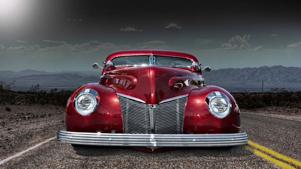 Обои на рабочий стол Красный Cadillac 1958 года автомобиль стоит на трассе