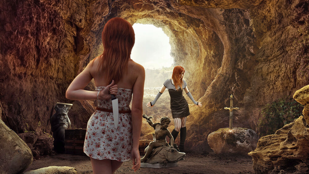 Обои для рабочего стола Две рыжеволосые девушки в платьях в пещере среди артефактов, одна с ножом за спиной