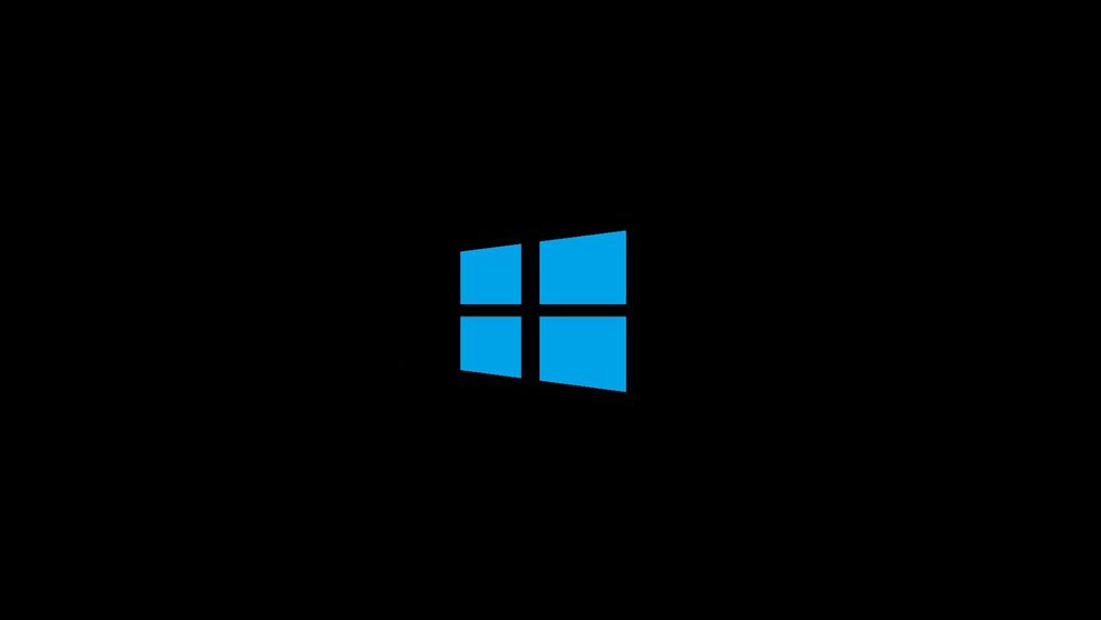 Обои для рабочего стола Логотип windows на темном фоне