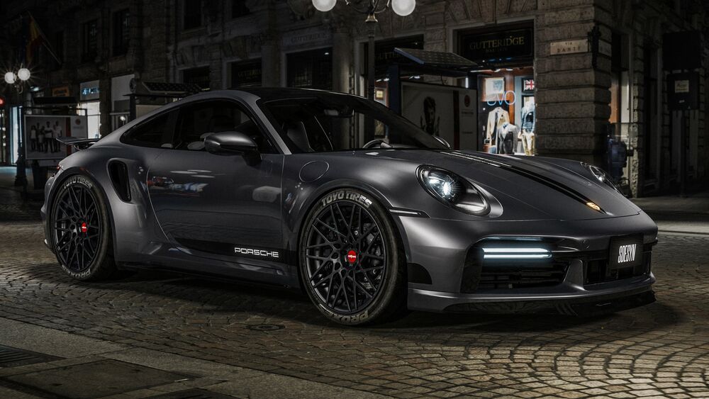 Обои для рабочего стола Сервй Porsche 911 S Black вечером на улице города