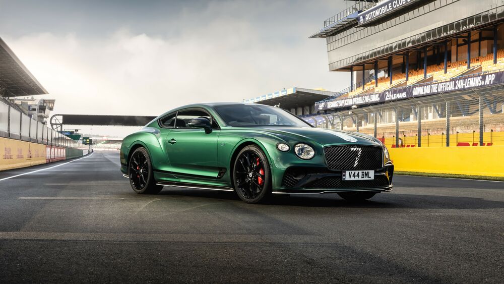 Обои для рабочего стола Изумрудный Bentley Continental GT на гоночной трассе