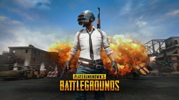Обои на рабочий стол Мужчина с оружием за спиной на фоне взрыва из игры PlayerUnknowns Battlegrounds