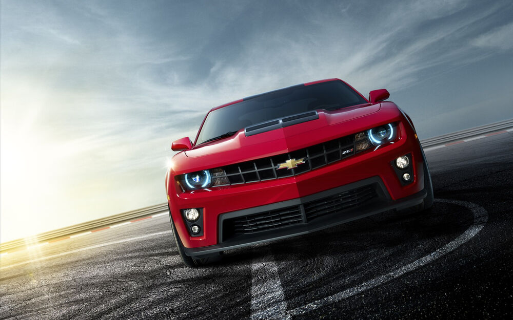 Обои для рабочего стола Красный Chevrolet Сamaro на треке