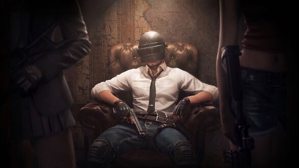 Обои на рабочий стол Мужчина из игры PUBG: BATTLEGROUNDS сидит в кресле за спиной девушек с оружием в руках