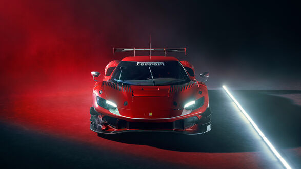 Обои на рабочий стол Ferrari 296 gt3 красного цвета стоит передом в красном дыму