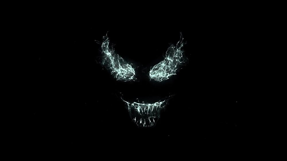 Обои для рабочего стола Образ Веном / Venom в виде пламени на черном фоне