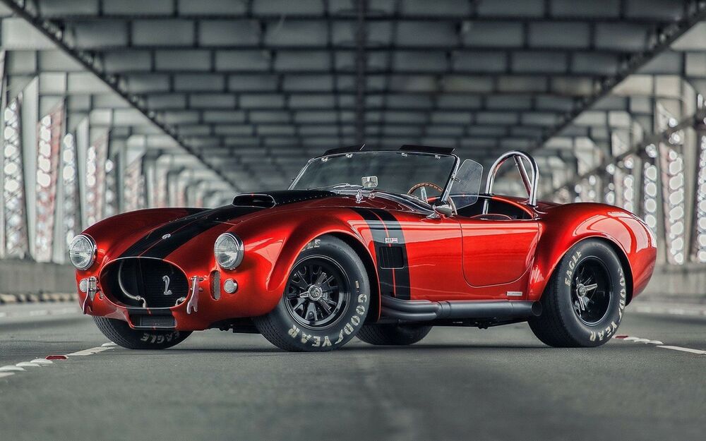 Обои для рабочего стола 1964 AC Shelby Cobra 427 красного цвета на на мосту на дороге
